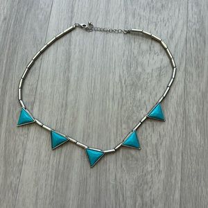 Silver beaded necklace with blue triangles